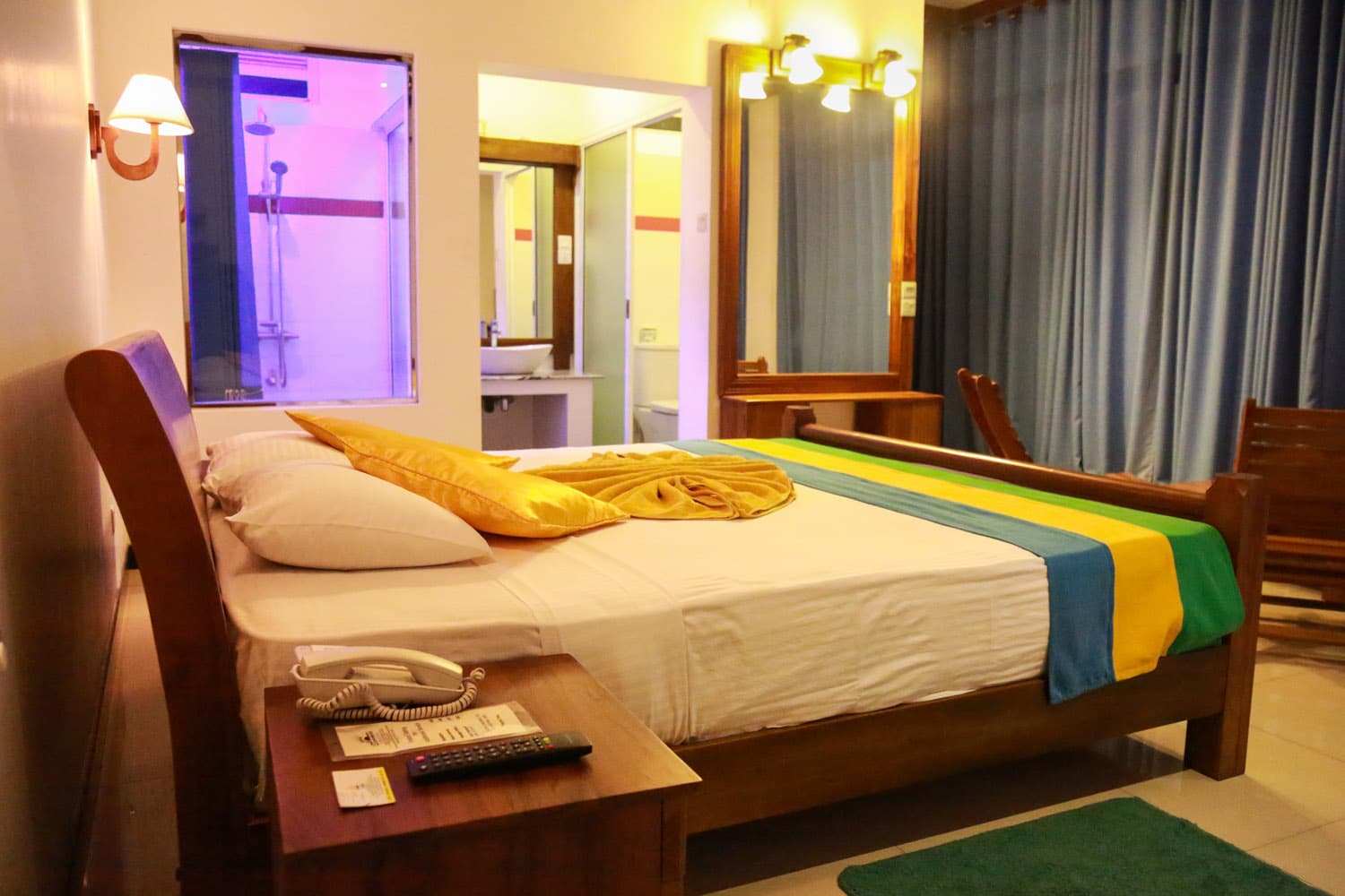 Spacious king room with warm lighting
