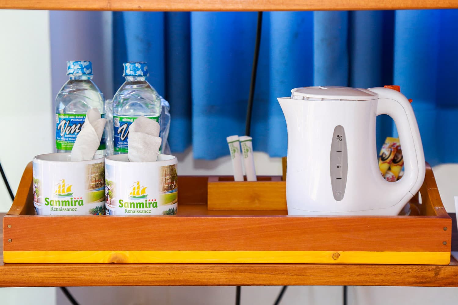 In-room tea and bottled water amenities