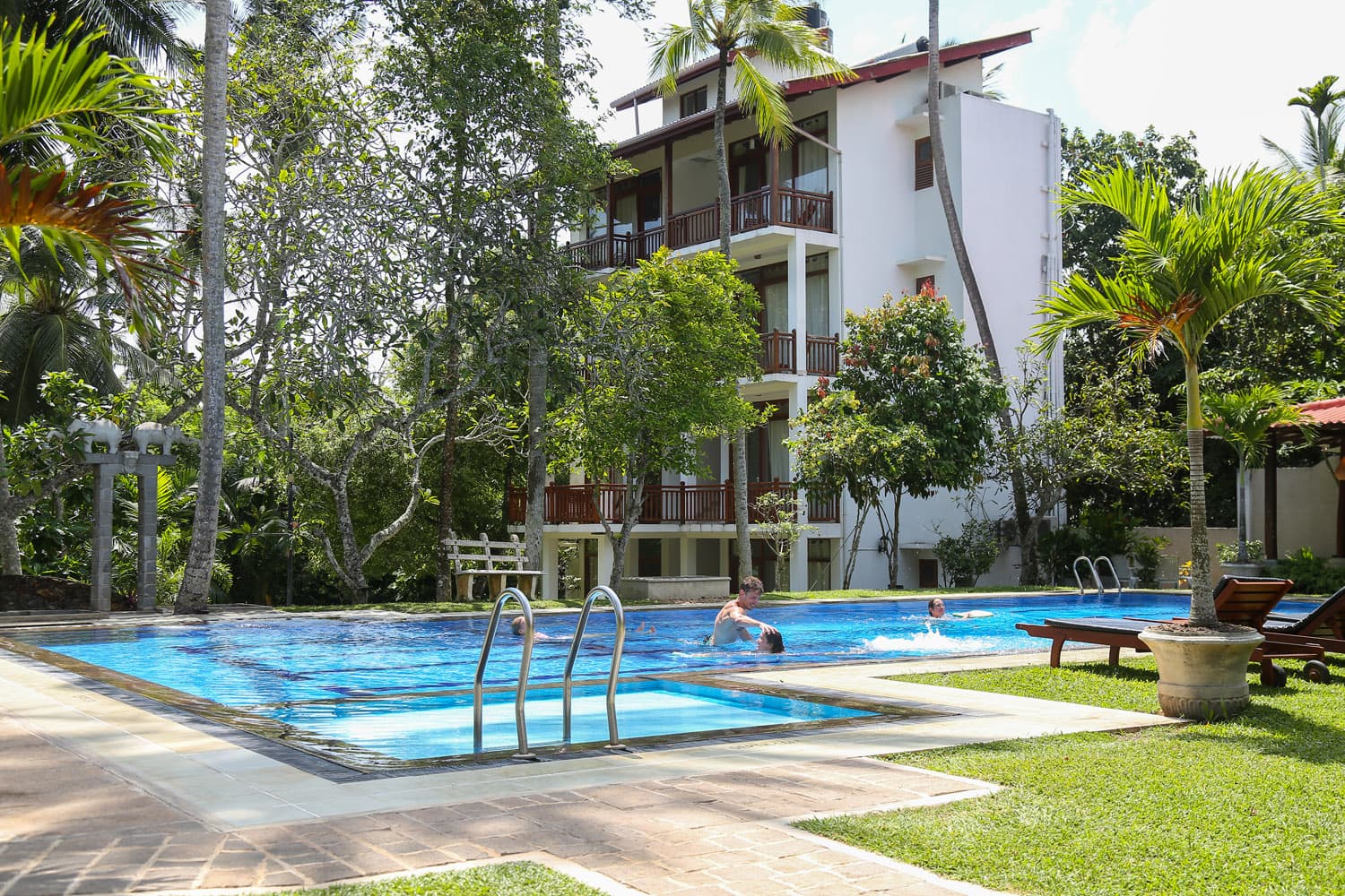 Poolside courtyard and hotel rooms