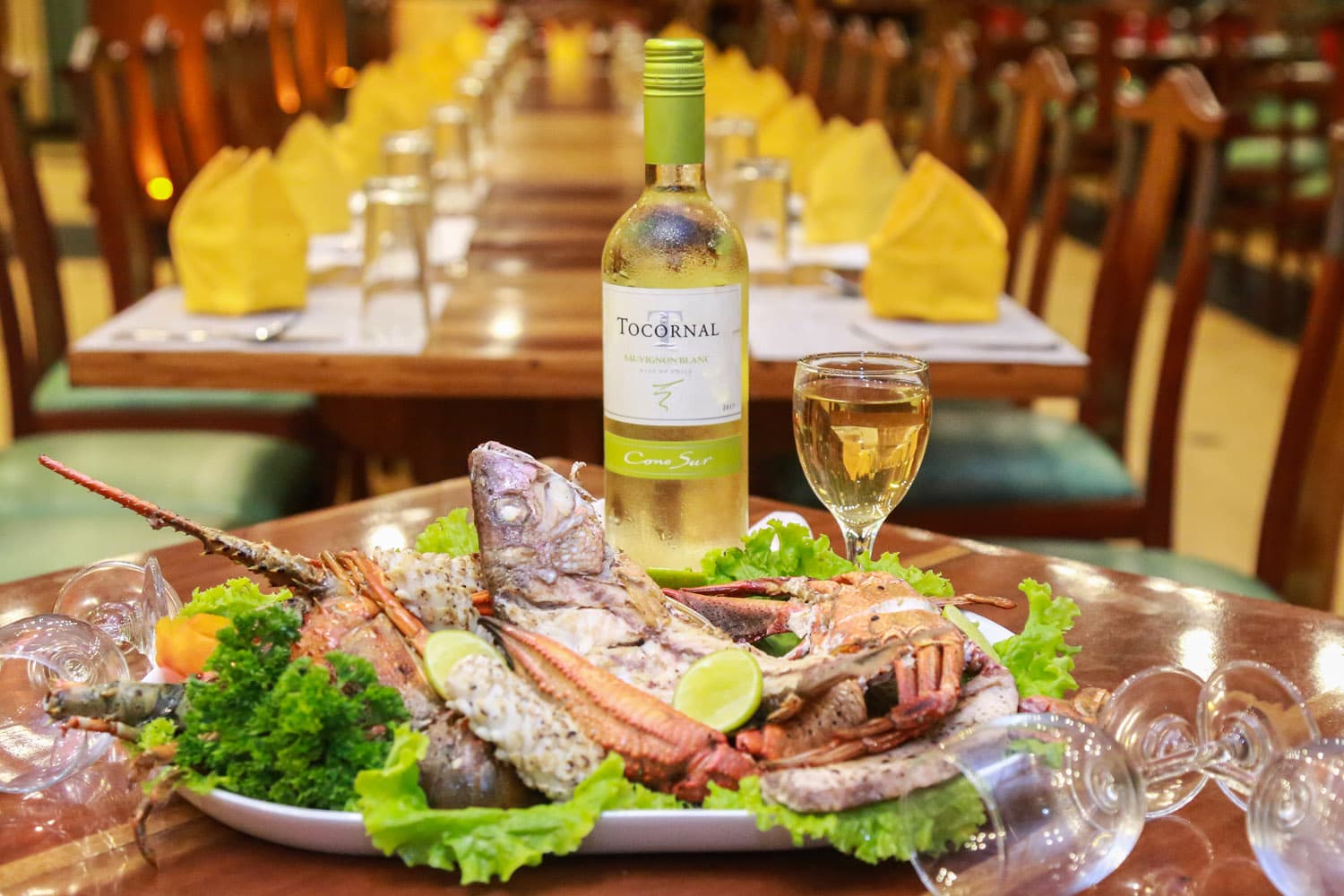 Grilled seafood platter with white wine