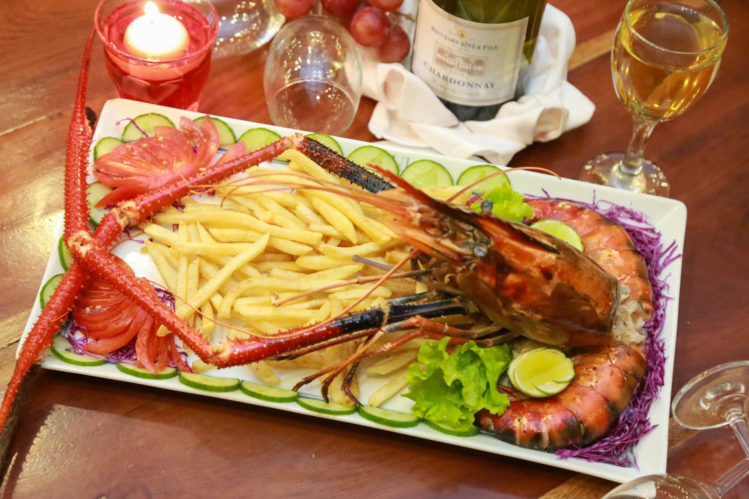Lobster and fries dinner plate