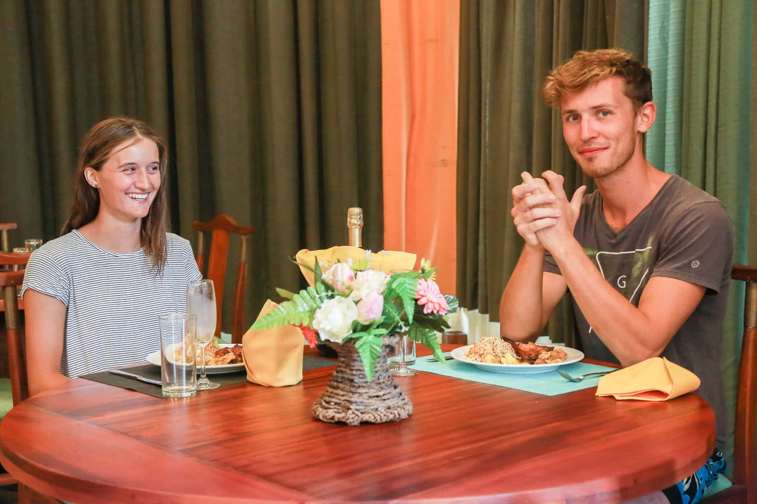 Restaurant dinner with tropical drinks